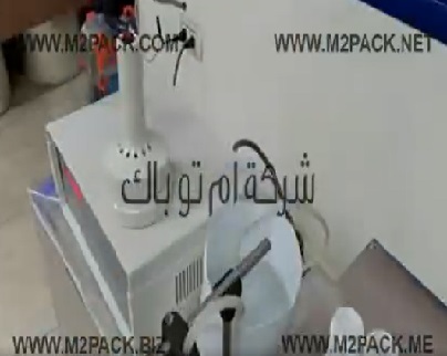 ماكينة تعبئة عبوات سوائل ديجيتال ديسك توب موديل 451 مع ماكينة إندكشن سيل للحام الطبات علي العبوات موديل 201 ماركة إم توباك