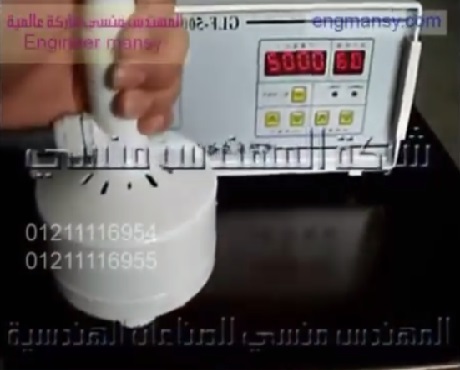 ماكينة تعمل بموجات الحث الكهرومغناطيس للحام طبات المونيوم فويل علي زجاجات الكيماويات موديل 201 ماركة المهندس منسي