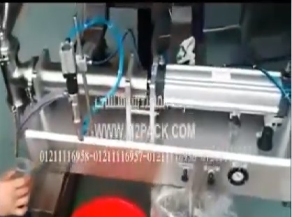 آلة تعبئة نصف أتوماتيك لتعبئة عبوات خل التفاح موديل 404 ماركة المهندس منسي