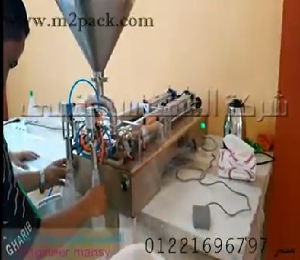 تشغيل ماكينة نص أتوماتيك لعبوات السوائل 2 نوزل كود 404 ماركة مهندس منسي