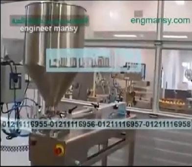 تعبئة جل شعر فى عبوات بماكينة تعبئة سوائل لزجة نصف أوتوماتيك موديل404 ماركة المهندس منسي