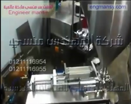 تعبئة نص اتوماتيك عصير ليمون في عبوات بماكينة برأس واحده كود 404 ماركة مهندس منسي