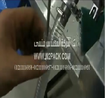 ضبط آلية عمل ماكينة تعبئة السوائل النصف أتوماتيكية موديل 404 ماركة المهندس منسي