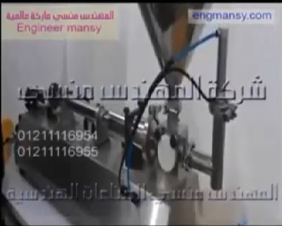 ماكينة تعبئة السوائل سواء العادية او اللزجة في عبوات واكياس نص اتوماتيك كود 404 ماركة مهندس منسي