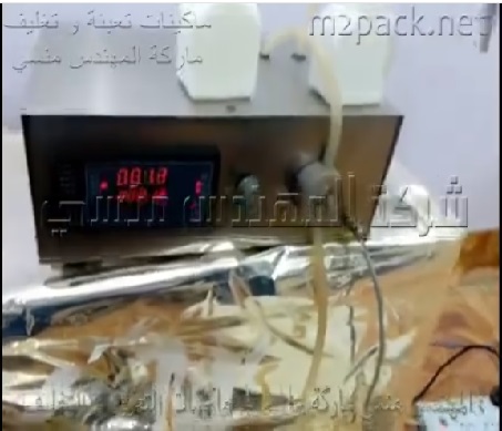 ماكينة تعبئة عبوات سوائل مختلفة ، عبوات ديتول ، عبوات شاور ، عبوات شامبو ، كود 451 ، ماركة مهندس منسي