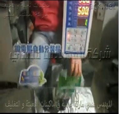 ماكينة تعبئة وزنية للأرز في أكياس نص أتوماتيكية موديل 904 مع لحام الكيس بماكينة رأسية موديل 303 ماركة مهندس منسي