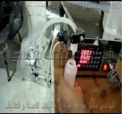 ماكينة ديسك توب لتعبئة الزجاجات البلاستيك بمعطر الجو نصف اتوماتيك كود 451 ماركة مهندس منسي