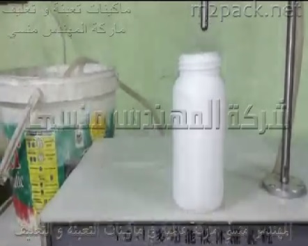 ماكينة ديسك توب نصف أتوماتيك لتعبئة سوائل في عبوات بلاستيك مثل المطهرات و المنظفات كود 451 ماركةالمهندس منسى