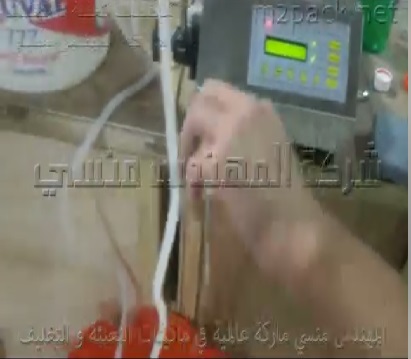 ماكينة سوائل ديسك توب لتعبئة عبوات كحول الطبي تشغيل بكهرباء 220 فولت كود 451 ماركة المهندس منسي