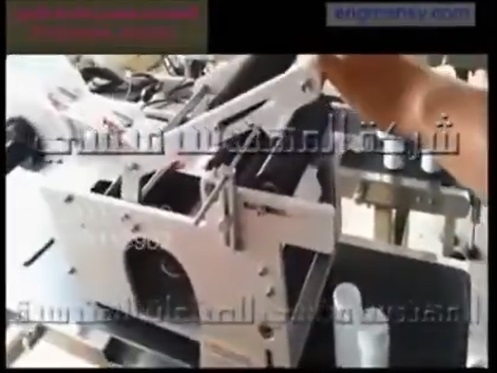 ماكينة نصف اتوماتيك للصق ليبل علي عبوات بودرة الاطفال كود 831 ماركة مهندس منسي