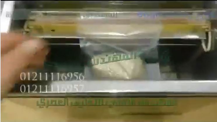 شرح لماكينة تعبأة فانيليا الحلويات بكيس المنيوم مع عمل فاكيوم للكيس بموديل 601 ماركة المهندس منسي