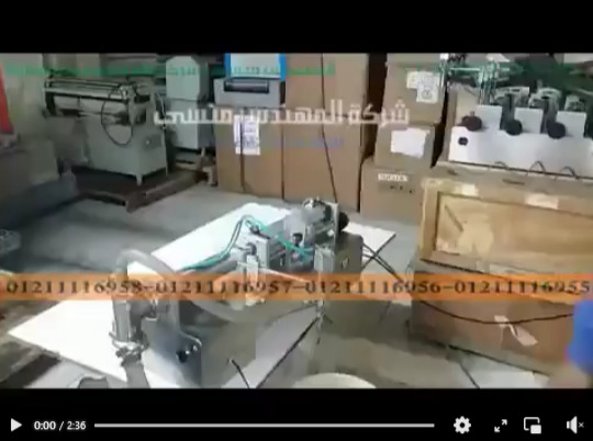 تعبأ نصف اتوماتيك لعبوة كلور 1 ليتر بماكينة موديل 403 ماركة المهندس منسي