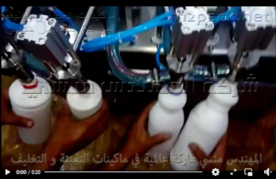 ماكينة 4 نوزل نصف أتوماتيكية لتعبئة سائل فلاش تنظيف الأرضيات بعبوات 1 لتر موديل 403 ماركة مهندس منسي