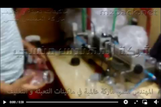 ماكينة نصف أتوماتيكية 1 رأس  لتعبئة السوائل ببرطمانات مثل العسل الأسود موديل 403 ماركة مهندس منسي