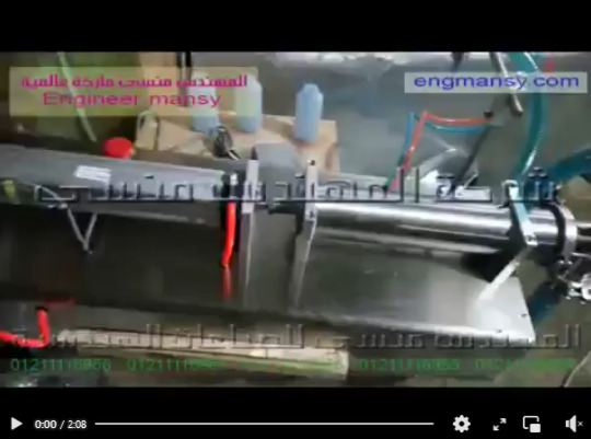 ‫ماكينة تعبئة نصف أتوماتيك لعبوات سوائل طبية و سوائل تجميلية و سوائل بيطرية نظام كمبروسر ضغط الهواء كود 403 ماركة مهندس منسي‬‎